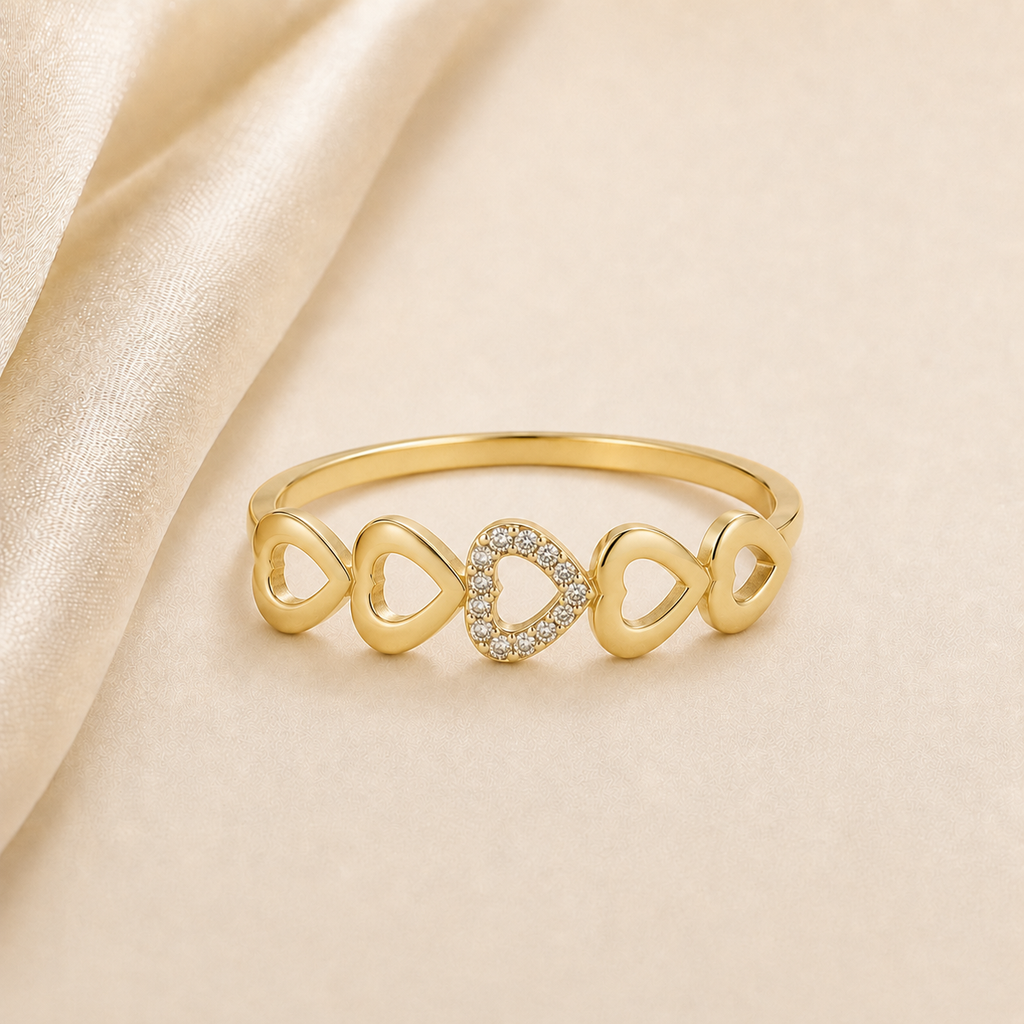 Anillo Corazones con Circonias en oro 10k