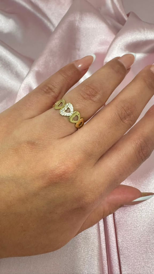Anillo Corazones con Circonias en oro 10k