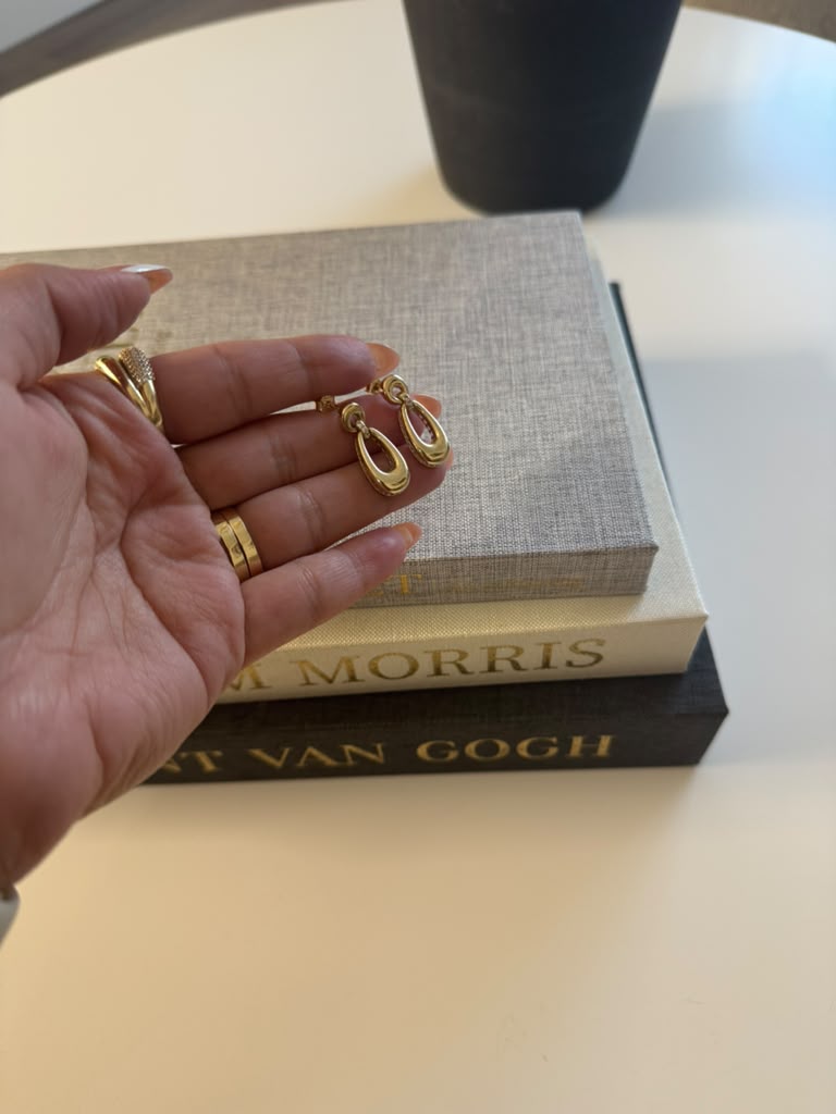 Aretes que cuelgan de 10k con piederas de circonia